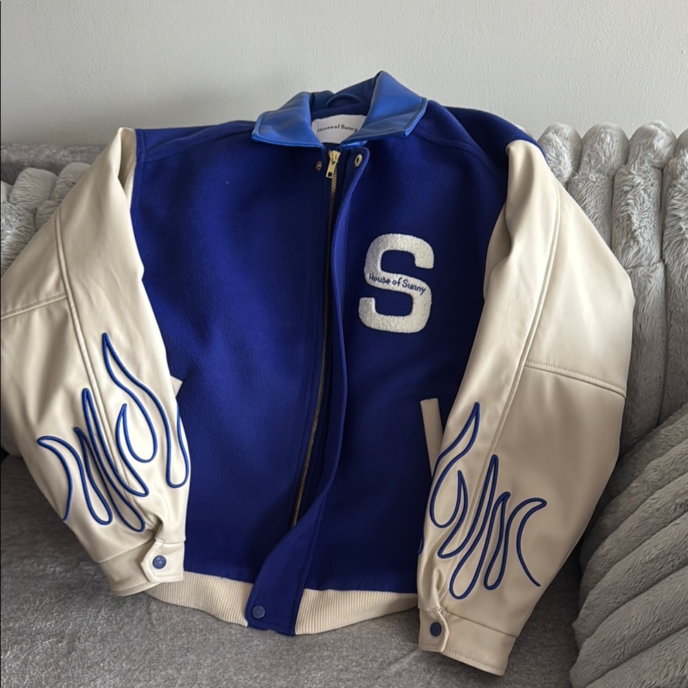 Blue and Cream Varsity Jacket with Flame Design